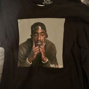 Black T-pac poetic justice shirt. Never been worn, but the tags were taken off.